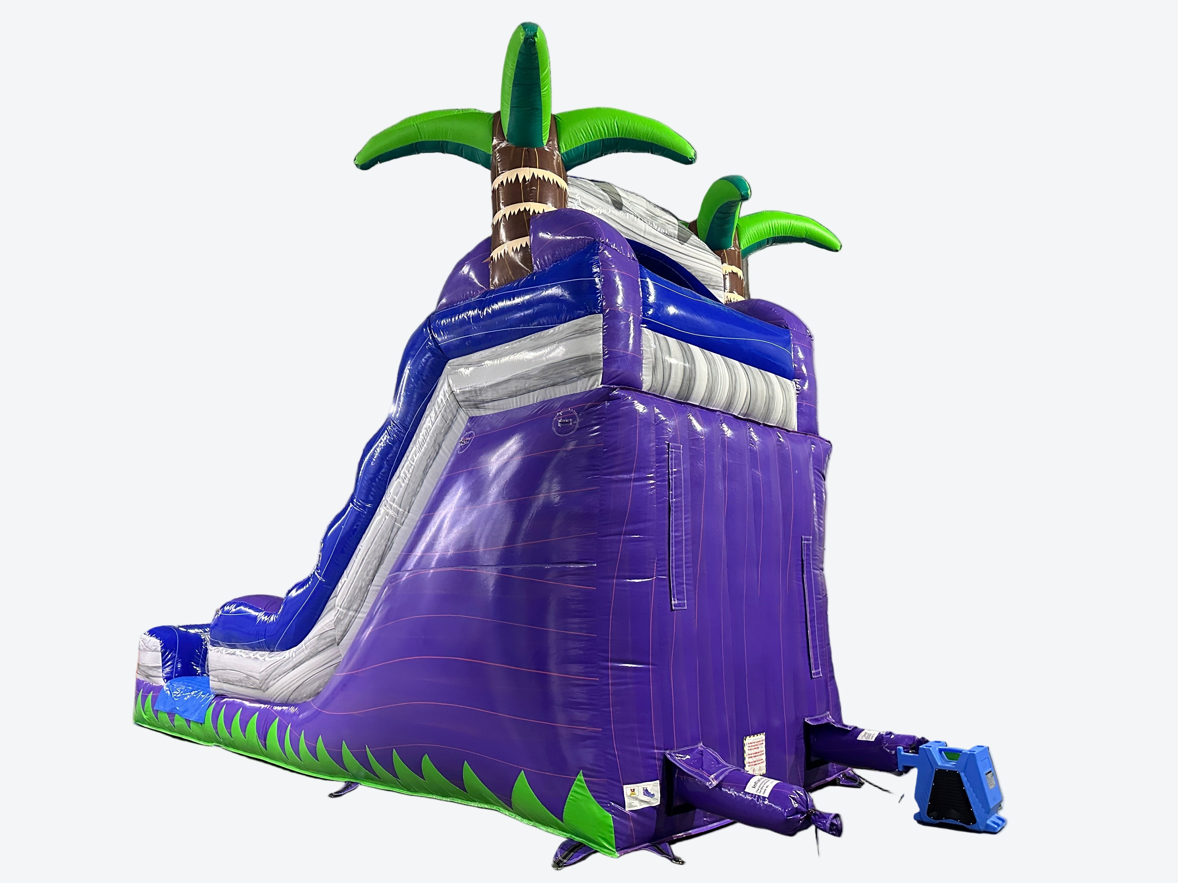 Large inflatable slide with palm tree design