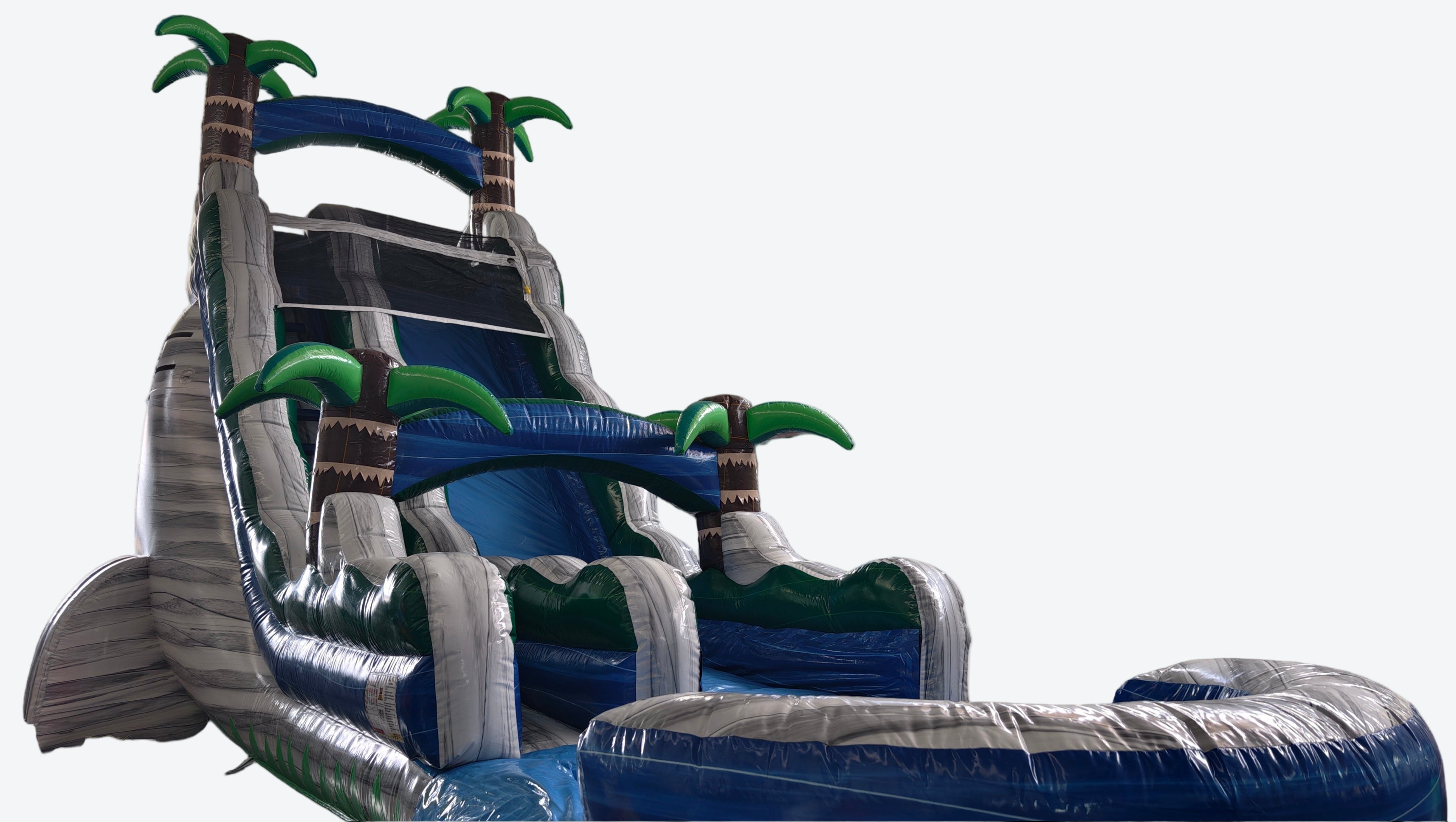 Large inflatable water slide with tropical design