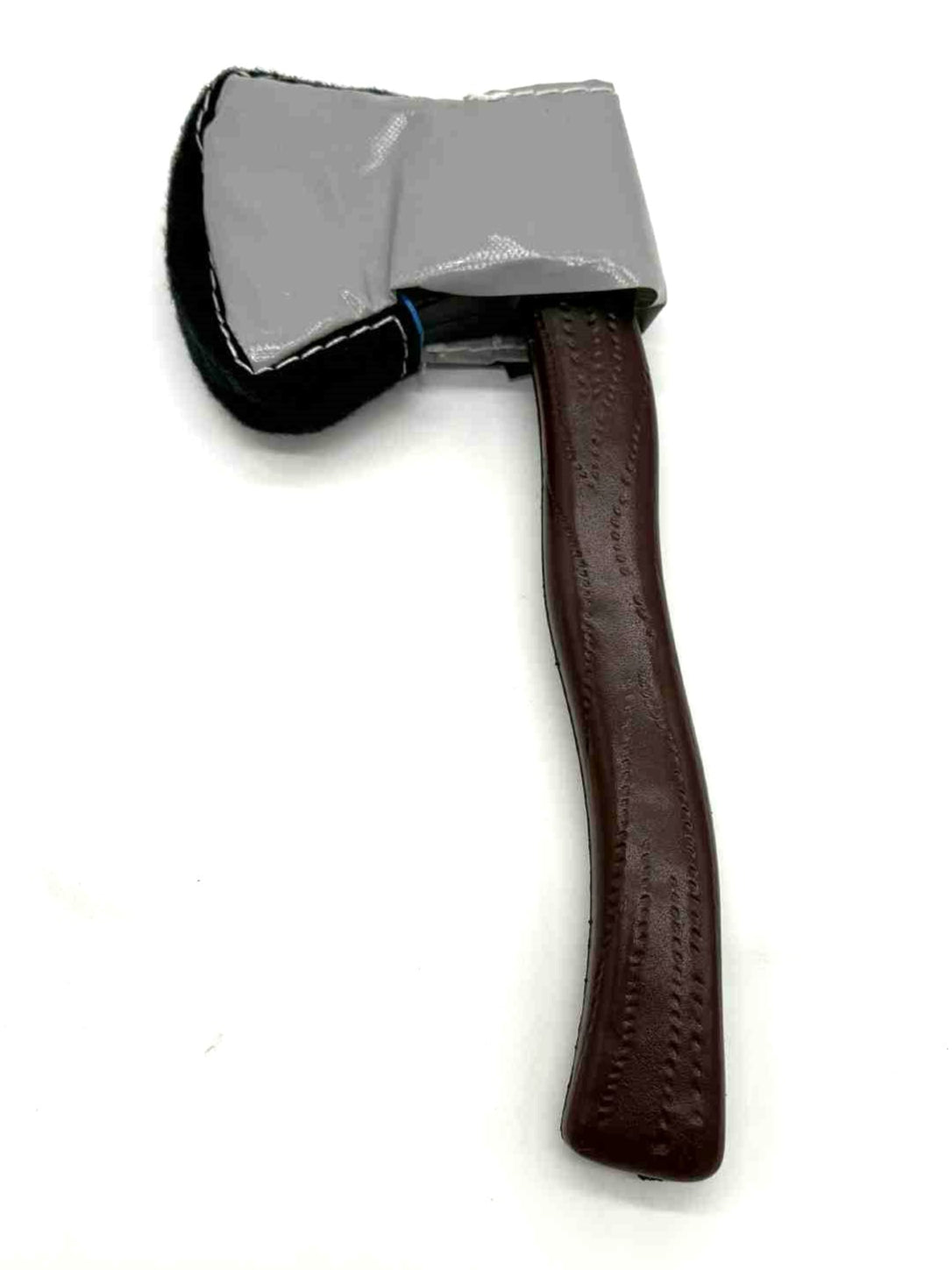 Toy axe with a wooden handle and metal head on a white background