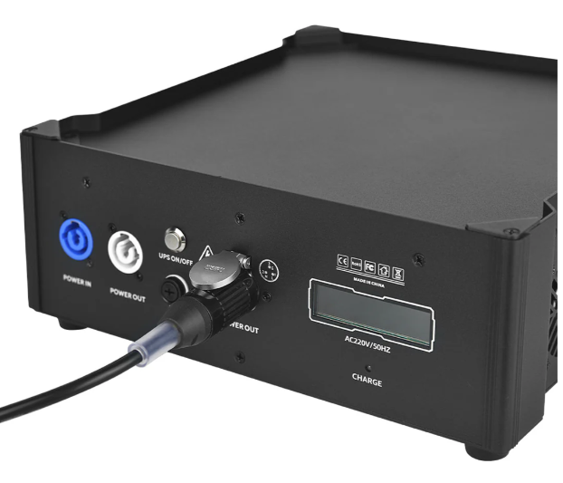 SurgeFX Spark Station portable battery base powering a cold spark machine.